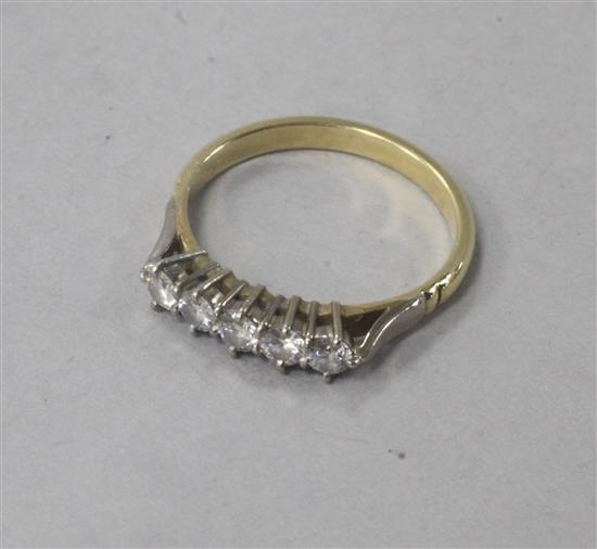 A yellow metal and five stone diamond ring, size M.